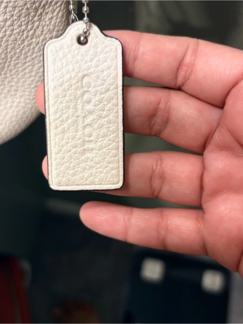 Coach Pebbled Leather Shoulder Bag in white and silver Strap
